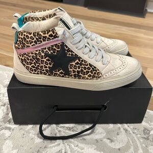 New Women’s size 9 leopard print high tops brand new leather